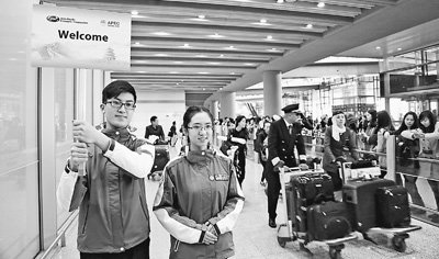 北京APEC會議首批志愿者上崗 來自北師大等5高校-中國教育1
