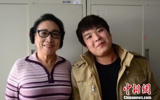 66歲“奶奶大學生”參加“魔鬼集訓營”四沖考研-中國教育1